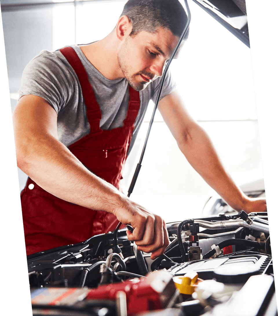 A guy tightening that last screw.